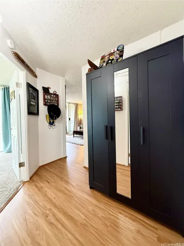 Storage closet in hallway near bedrooms