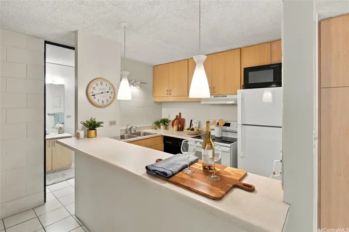 Functional kitchen with ample cabinetry.
