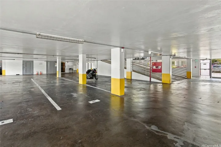 Secure covered parking on street level as you enter garage.