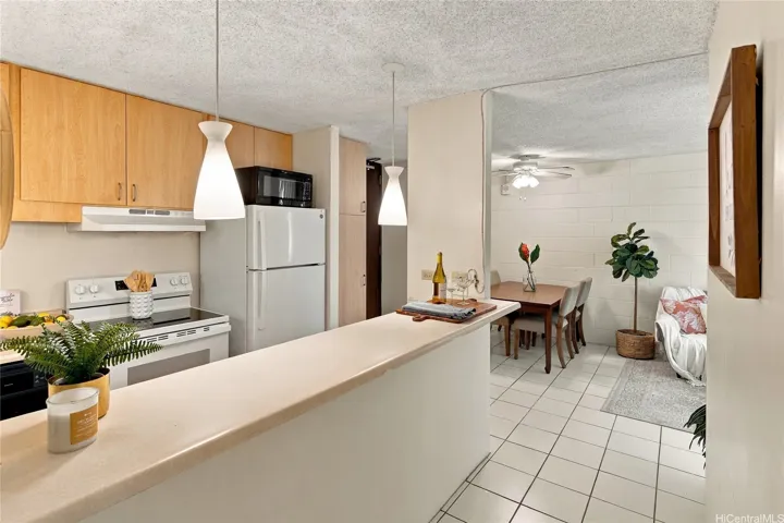 Kitchen opens to dining and living area.
