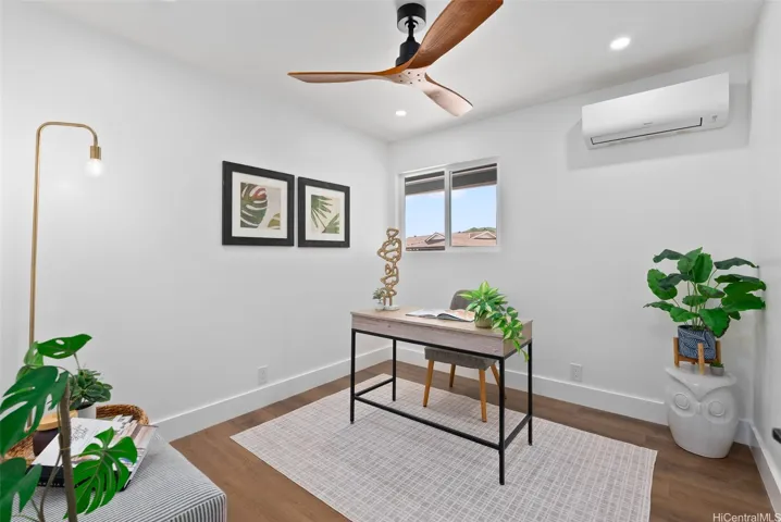 Versatile first bedroom, perfectly suited as a home office or guest room.
