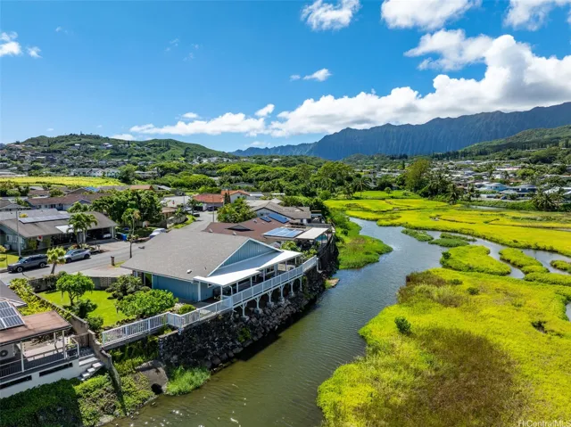 Stunning waterfront setting surrounded by lush wetlands and majestic Ko?olau Mountain views.
