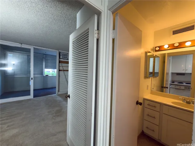 View from the bathroom to the back bedroom