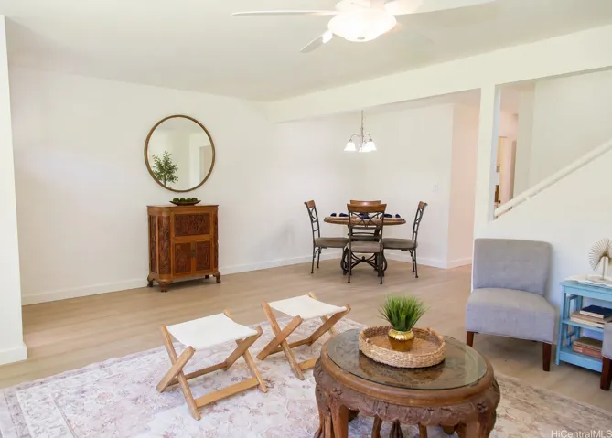 Bright, open living and dining spaces create an easy everyday flow, with fresh finishes and plenty of room to relax, gather and entertain. | Enhanced