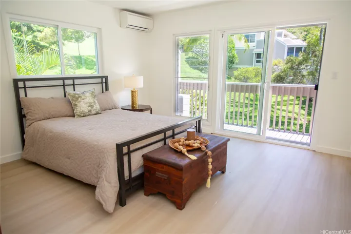 Large windows bring in beautiful natural light, while the split AC adds comfort year-round. | Enhanced