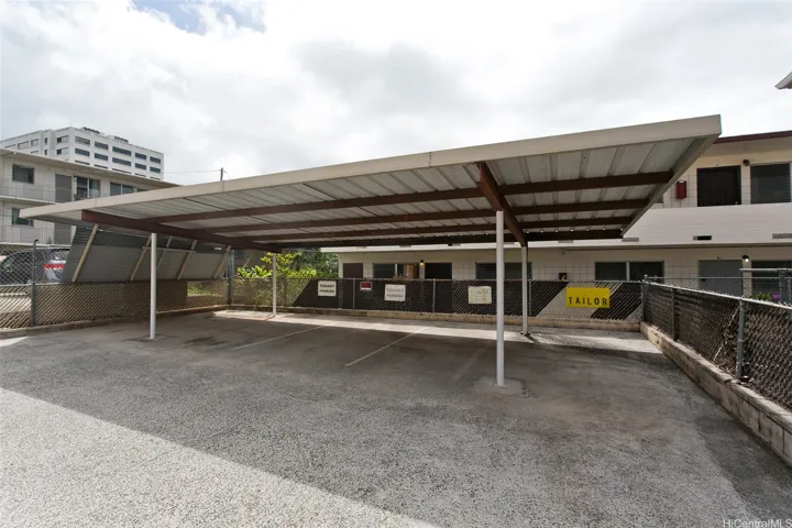 Covered parking situated at the rear of the property.