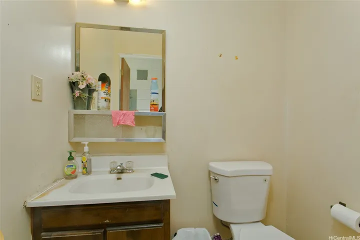 Ground floor half bath presently assigned to Space no. 2