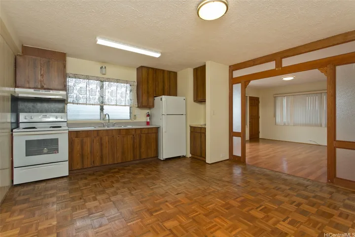 2nd floor kitchen area.  Living room is in the background