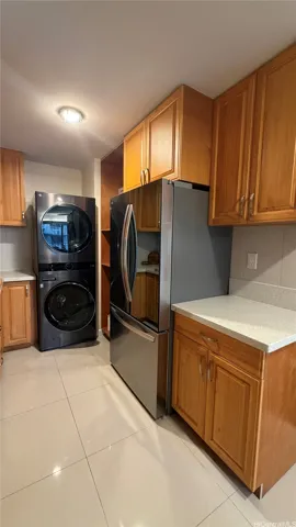New refrigerator, full size washer and dryer in unit