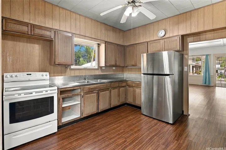 Kitchen with generous cabinetry and functional workspace.