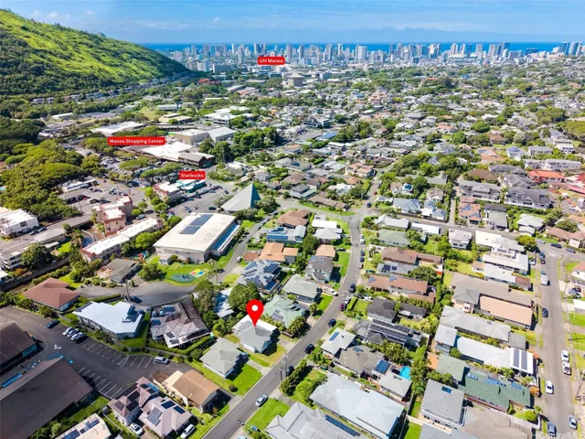 Aeiral view showcasing the home's convenient Manoa setting. One block from Manoa Shopping Center.