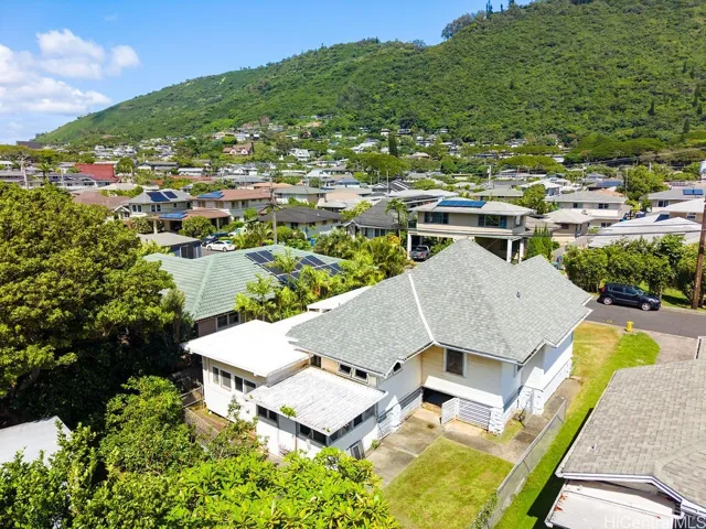 Aerial perspective of the home and surrounding Manoa neighborhood.