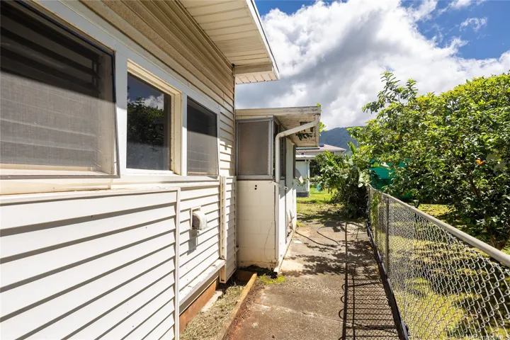 Side exterior and walkway with access around the home.