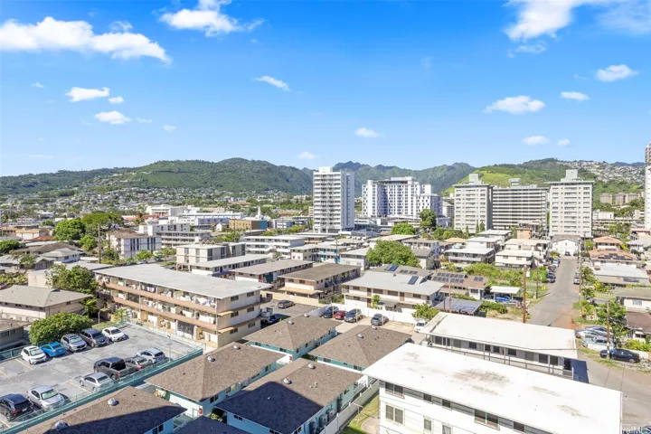 Views of Manoa Valley and Honolulu city lights from the juliet balcony of the living room.