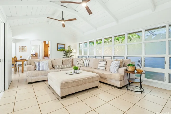 Bright upstairs living area with vaulted ceilings.