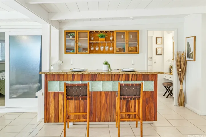Custom wet bar in open-concept living area