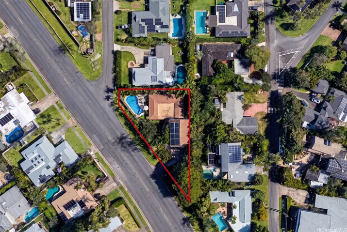 Aerial view highlighting the property lot