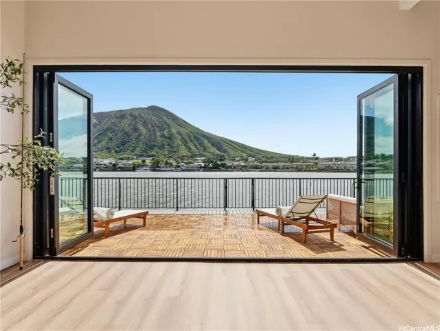 Breathtaking Marina front setting with disappearing doors for indoor outdoor living