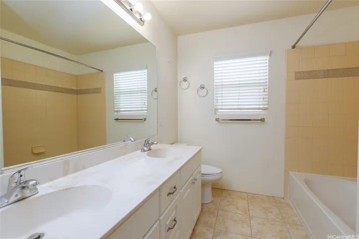Primary bathroom where walk in closet is located