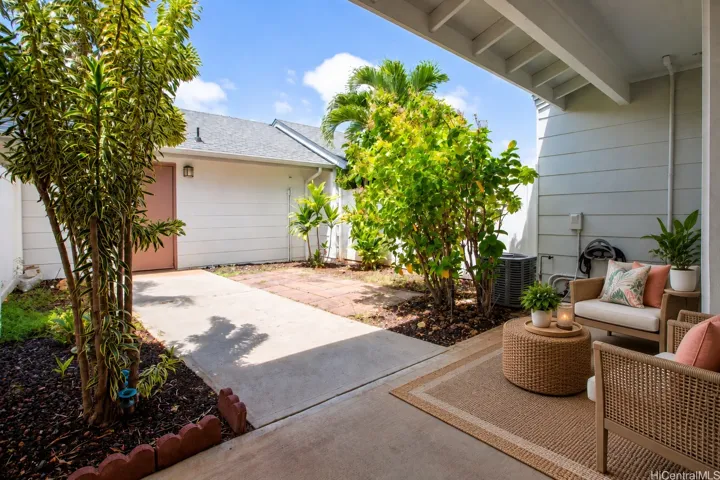 Virtually staged patio and backyard.