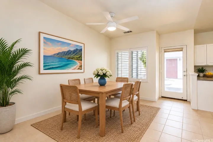 Virtually staged dining room right off the kitchen.