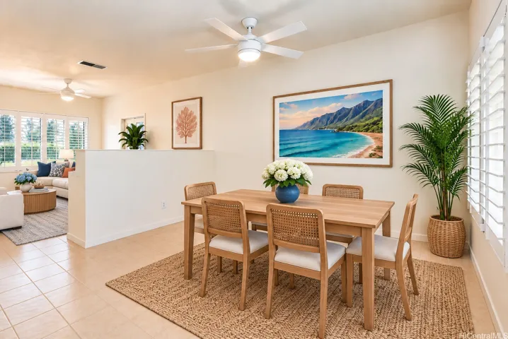 Virtually staged dining and living room.