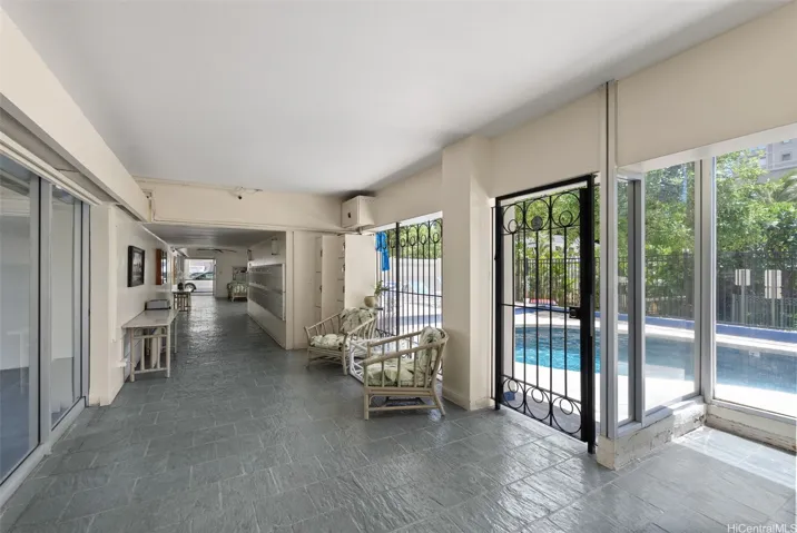 Secured entryway, mailboxes, and pool access.