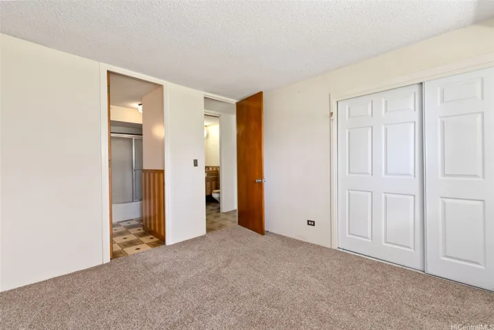 Bedroom #2 entry to bathroom and entry to hallway.