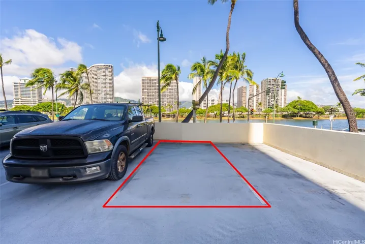Uncovered, assigned parking stall.