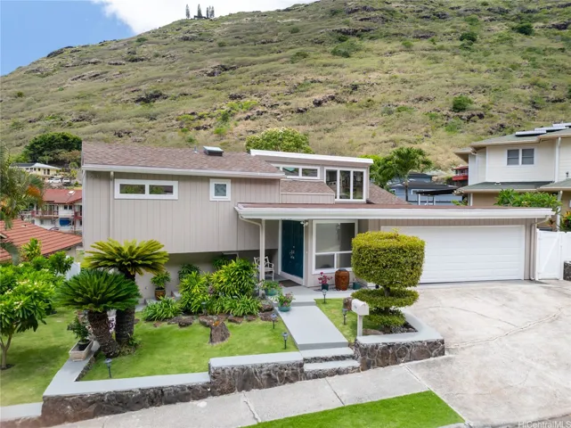 Great curb appeal highlighted by a meticulously landscaped yard.