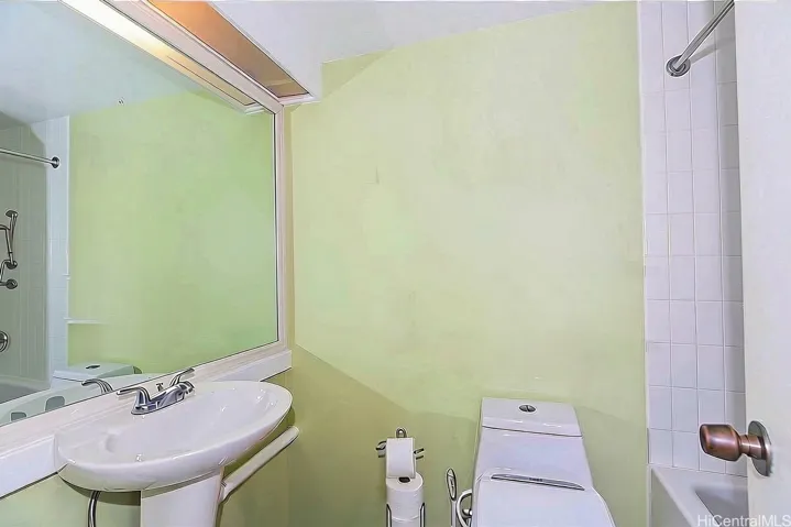 Full bath with tub and more closet space.