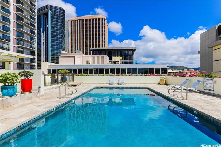Newly Titled pool & new lounge chairs for comfortable tanning or a good book.