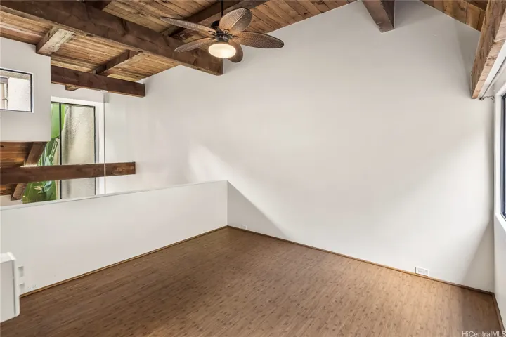 Primary bedroom loft without staging