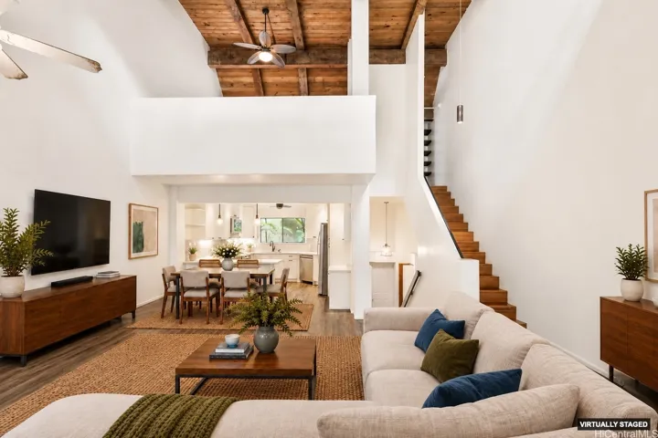 View from main floor with 1 bedroom upstairs and 2 bedrooms + bonus room downstairs