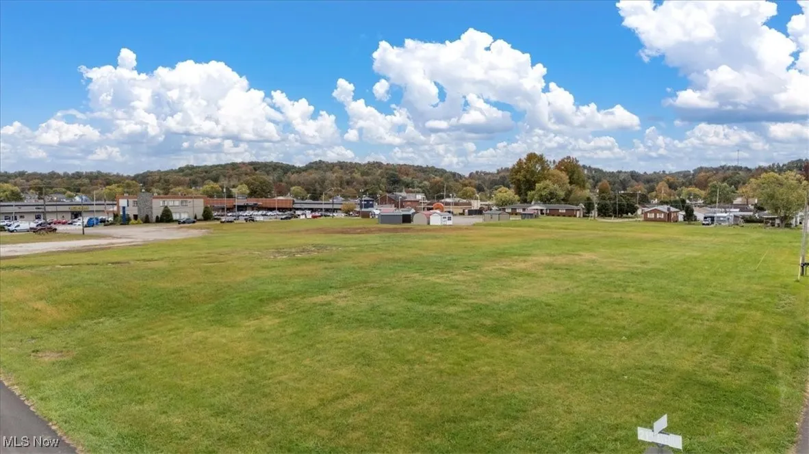 View of home's community featuring a lawn