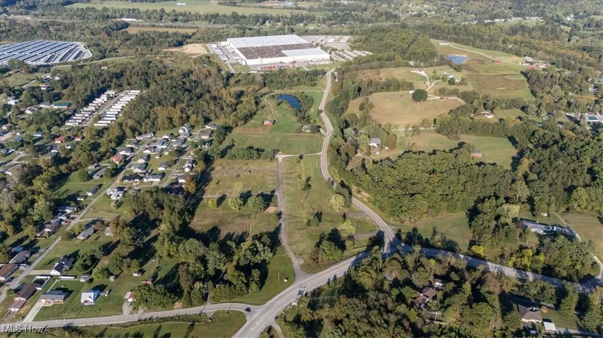 Aerial view of property and surrounding area.