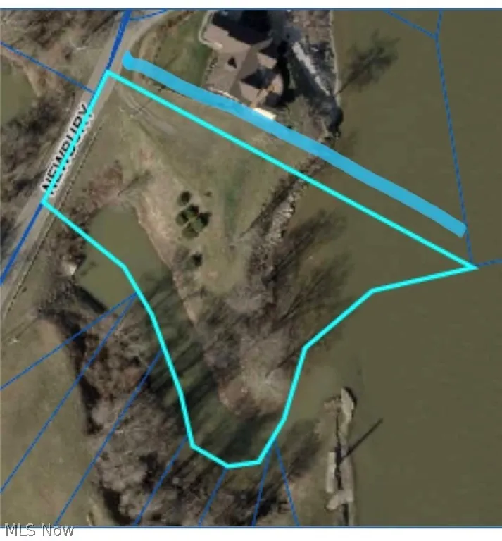 Per owner the property line follows the neighbors fence