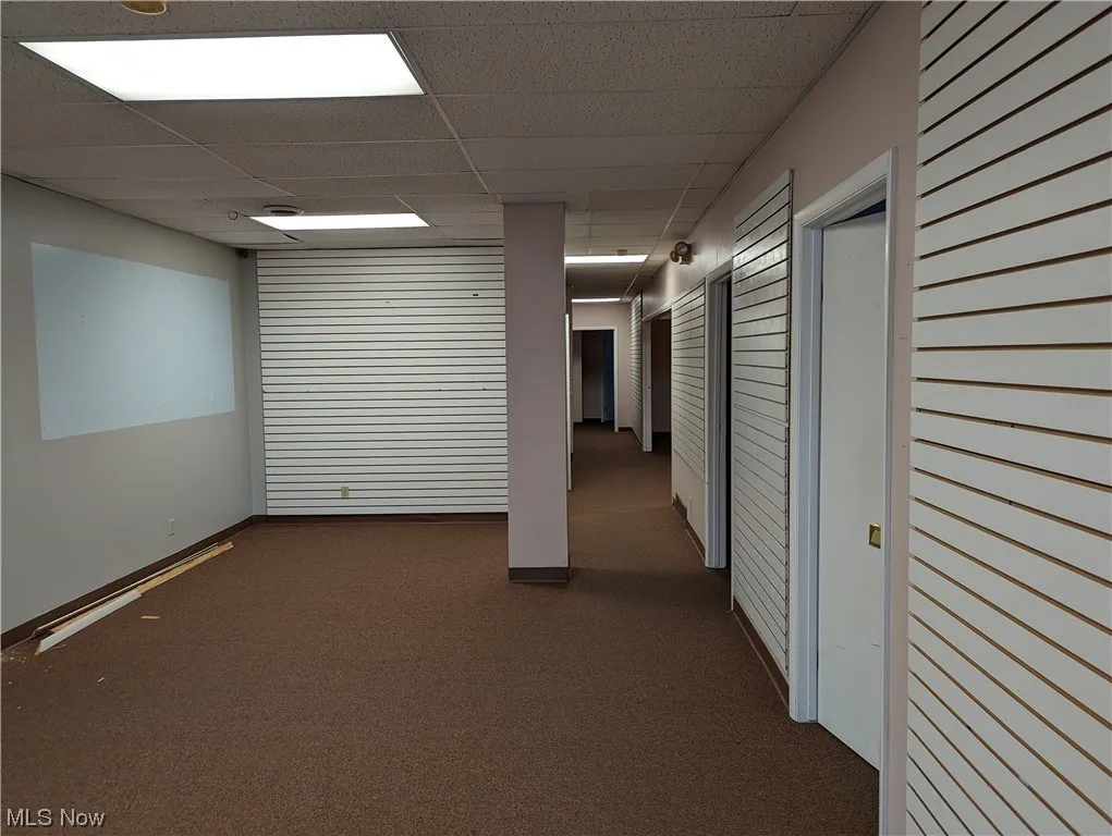 When you first walk into the space.  Large room for reception and display. There are two offices off on the right side in those first 2 pictured doorways.