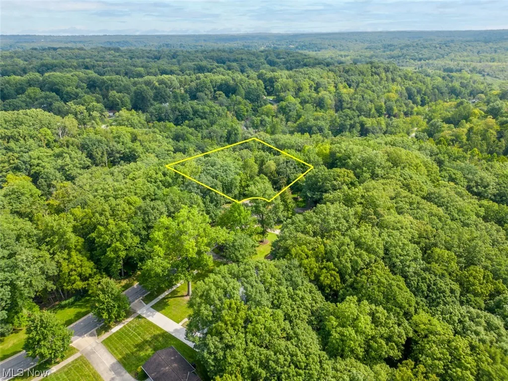 Welcome to 10585 Whitewood Road in Brecksville, OH 44141. 2.01 acre lot. Birds eye view of property