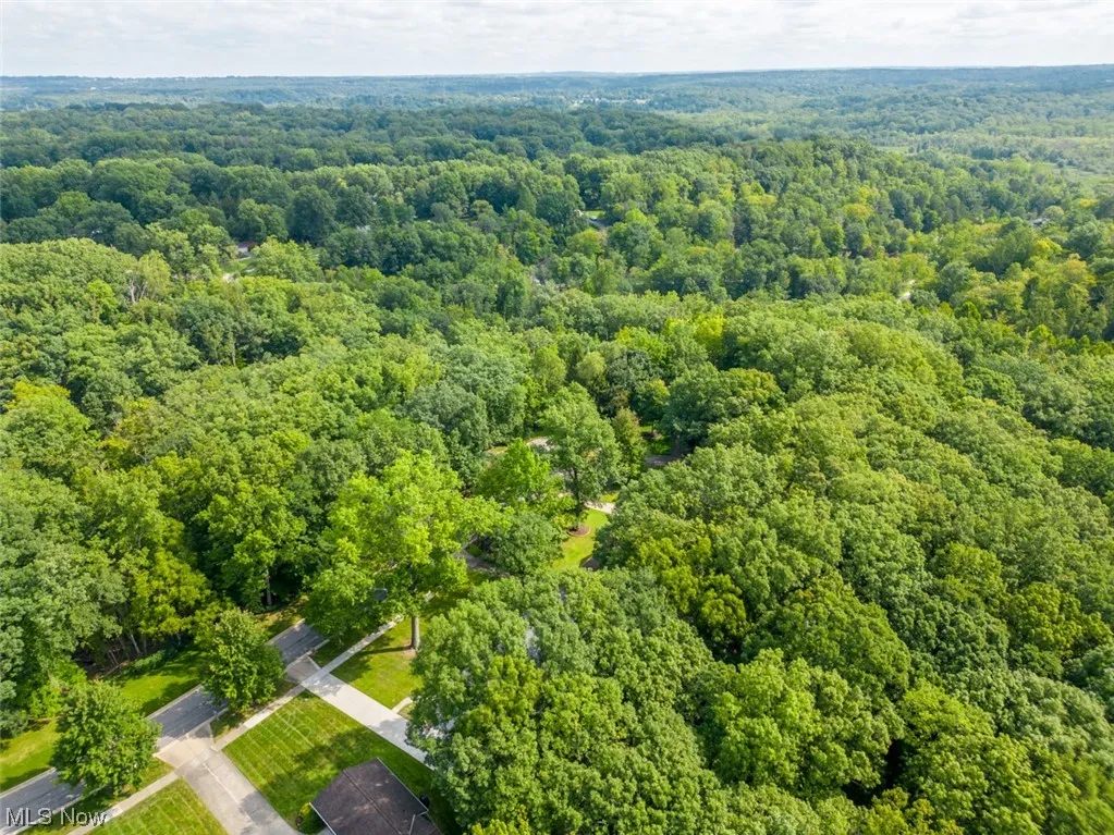 Welcome to 10585 Whitewood Road in Brecksville, OH 44141. 2.01 acre lot. View of drone / aerial view