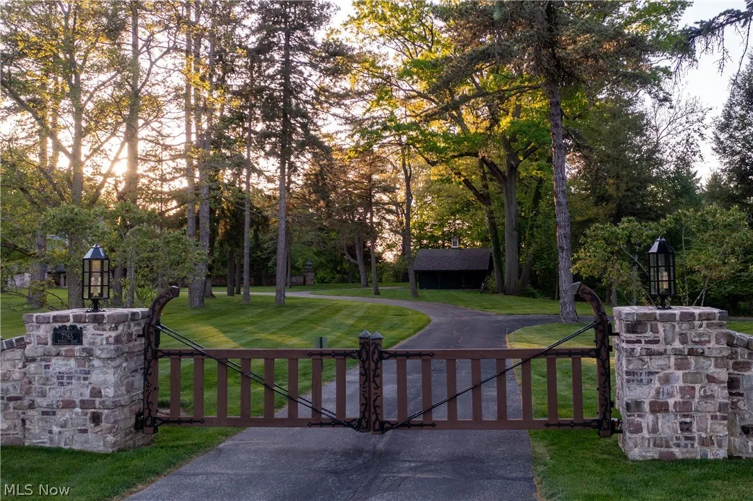 View of gate with a yard