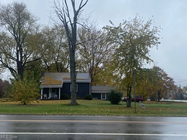 View of front of home featuring a front lawn