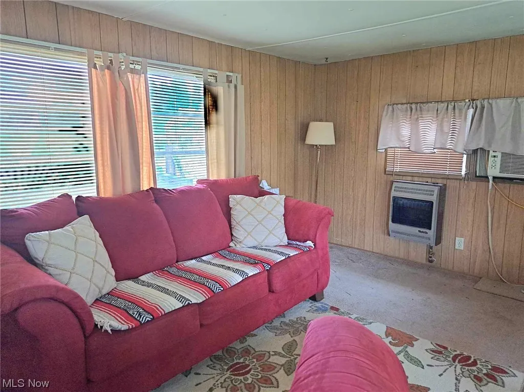 Living Room with Wall Heater and Window AC