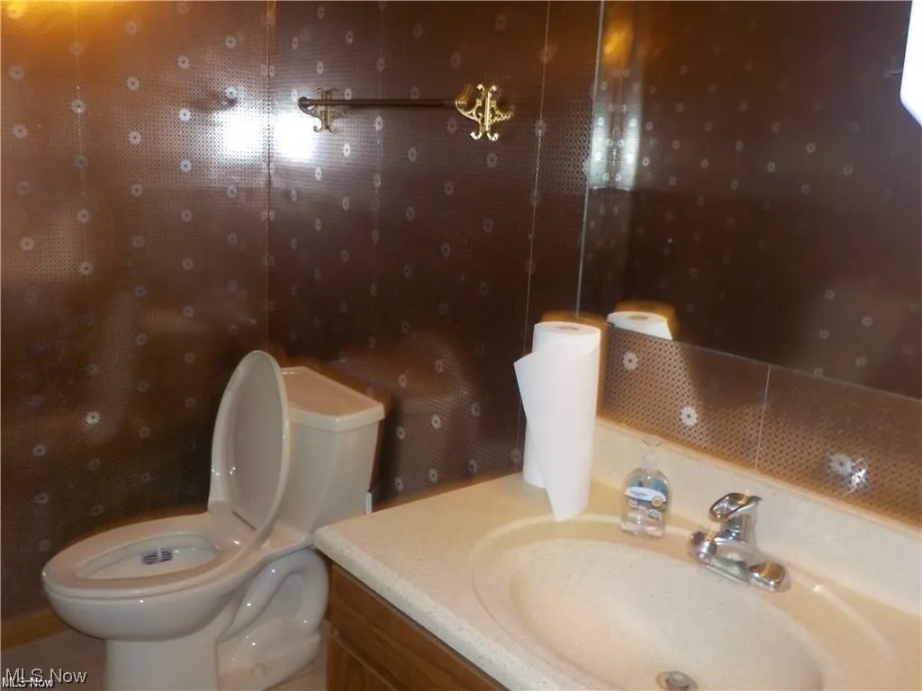 Bathroom featuring toilet and vanity
