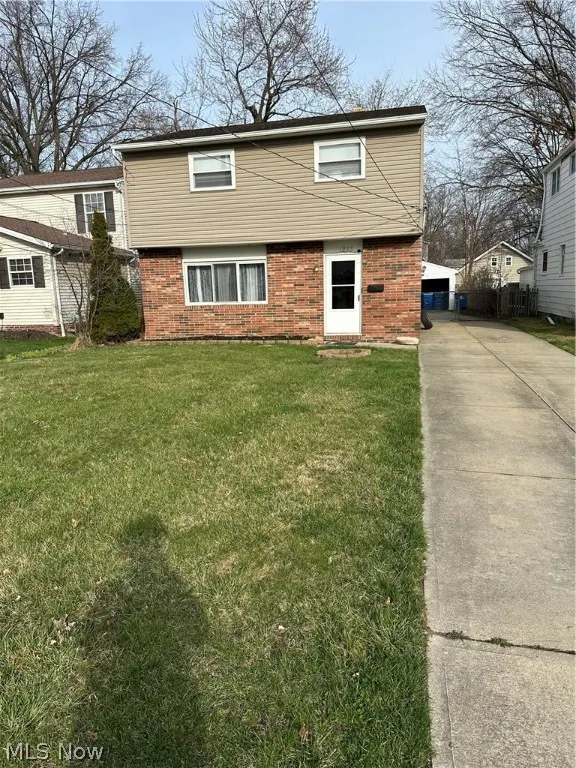 View of front of house with a front lawn