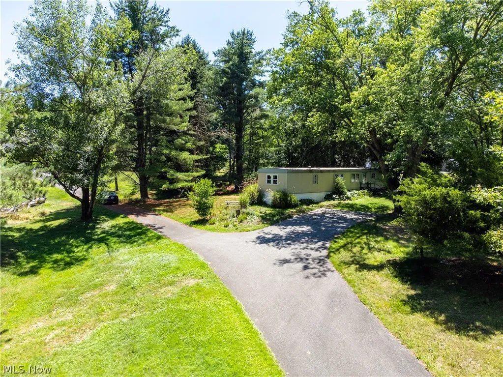 View of front of property featuring a front yard