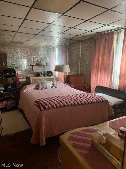 Bedroom featuring a paneled ceiling