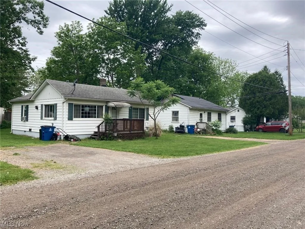 Single story home featuring a front yard