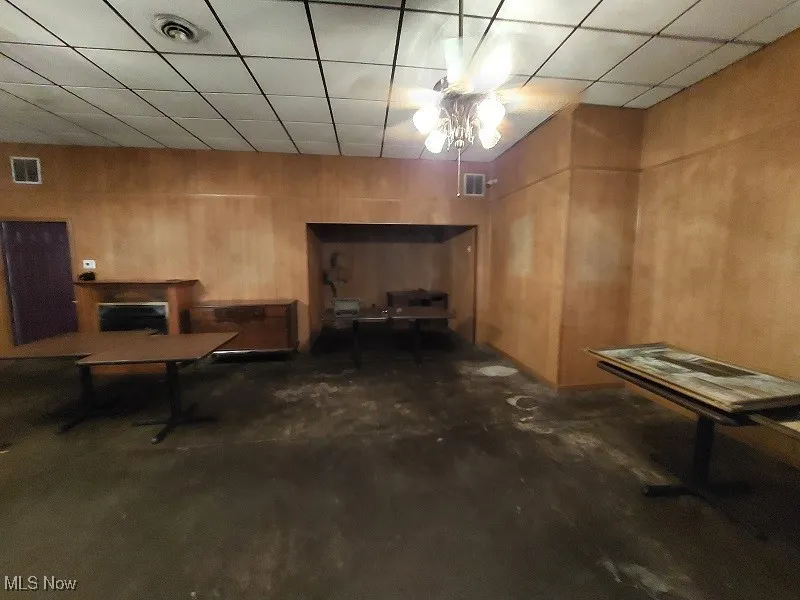 Basement featuring a paneled ceiling