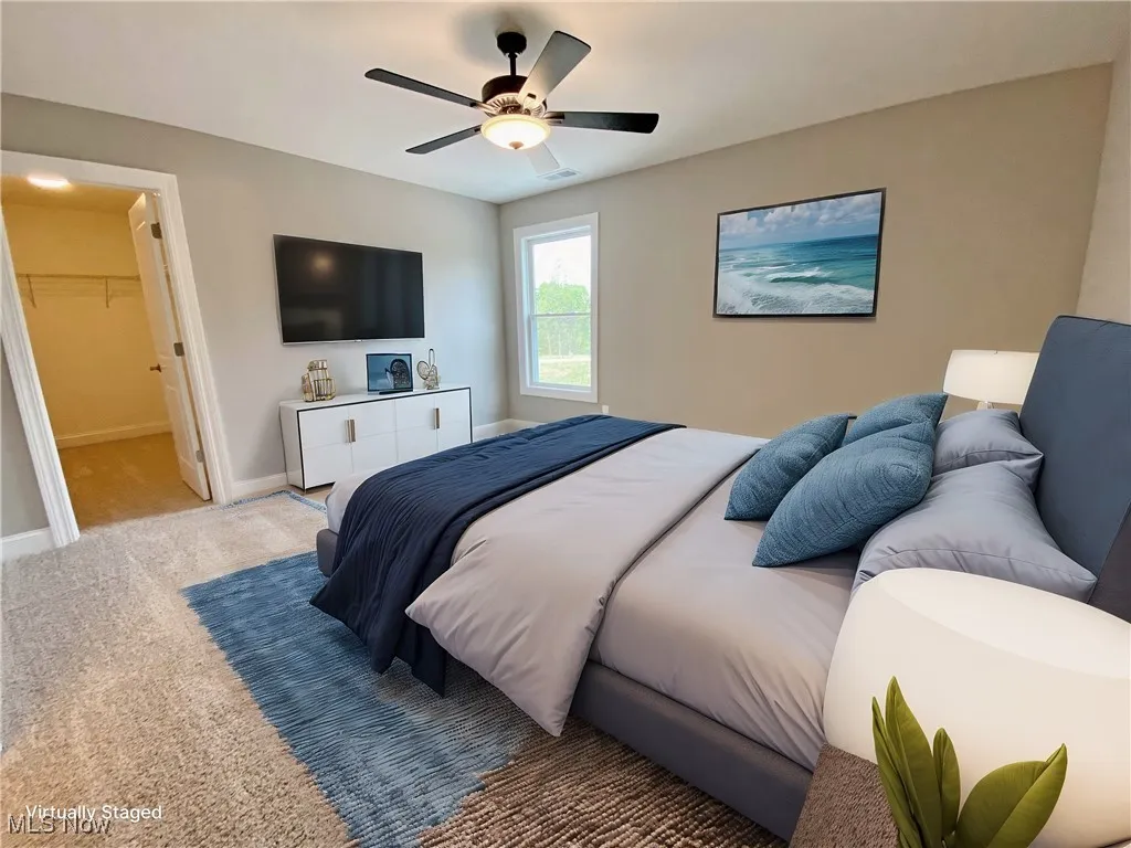 Bedroom with light carpet and ceiling fan and Jack n Jill Bathroom